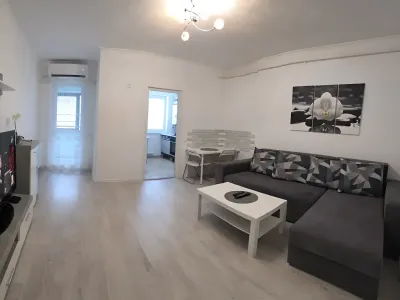 inchiriere garsoniera Sector 6, București sufragerie cu mobila si tv